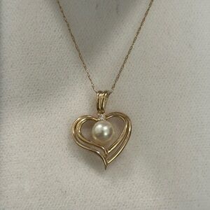 Pearl and diamond heart necklace